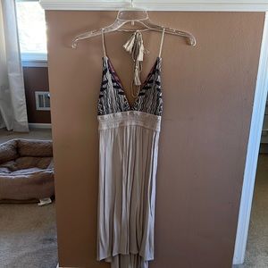 Mid length, low back halter dress